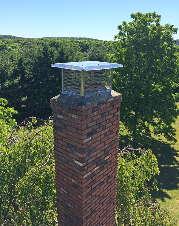 chimney cover keeps rain and animals out