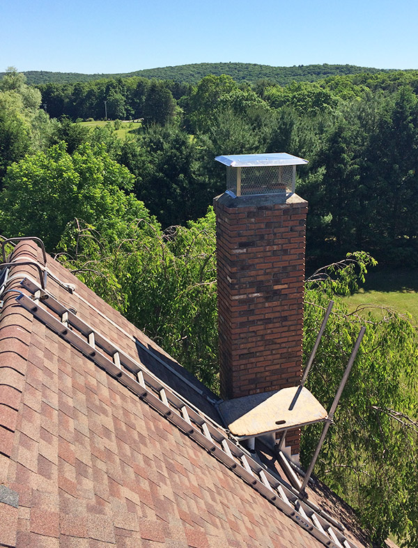 adding a new chimney rain cap
