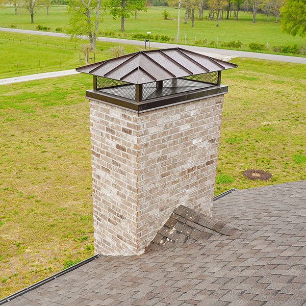 Avoid High Chimney Repair Costs By Having A Chimney Cap Installed