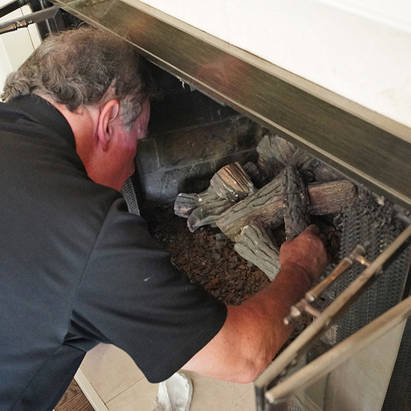 Preparing fireplace for summer in Millerton NY