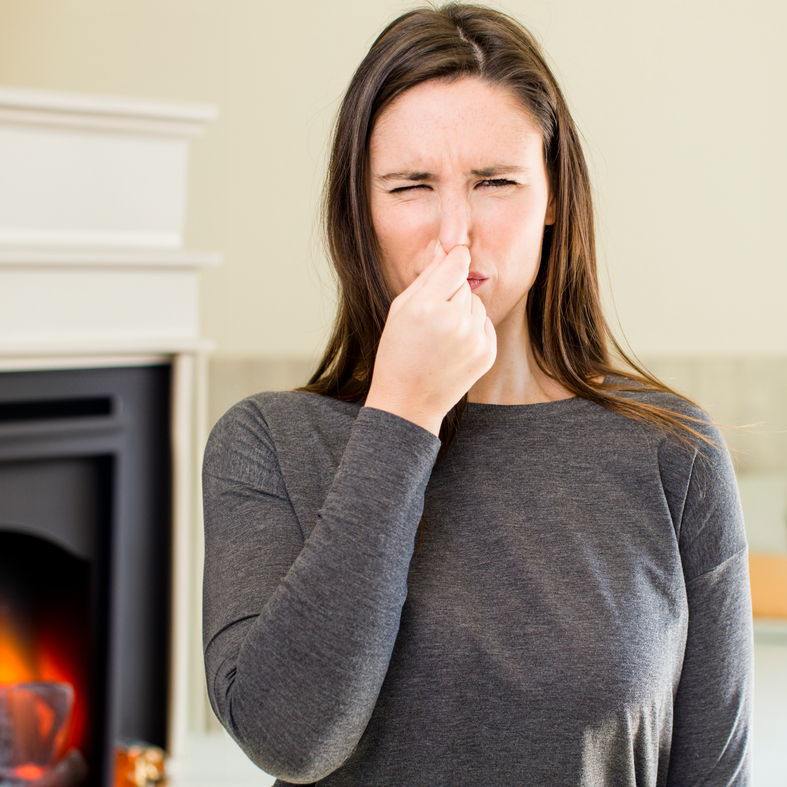 Smells of moisture coming from your fireplace indicate a leak from either the cap or a cracked chimney crown in Kingston, New York